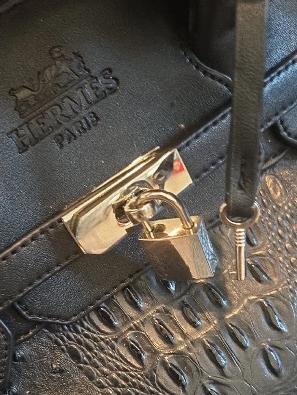 Elegant Black Structured Satchel with Gold Hardware